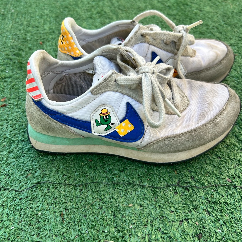 Nike Kids White, Blue & Gray Sneakers with Playful Patch